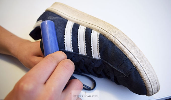 Using wax to water proof trainers