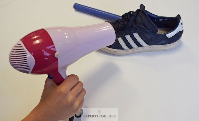 Waterproofing shoes with hairdryer & candle