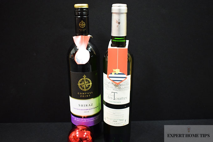 Decorate those wine bottles with old Christmas cards