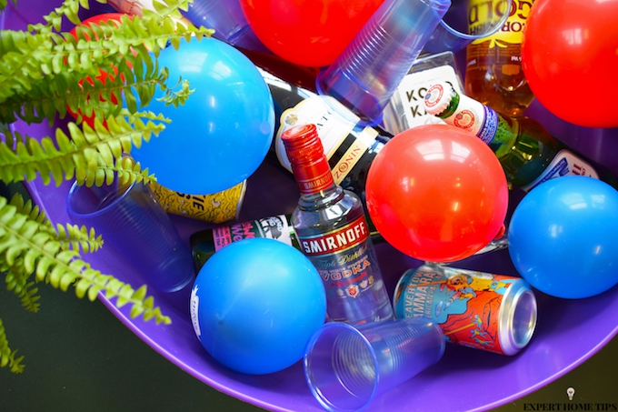 bucket of alcohol and balloon ice cubes