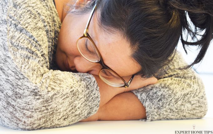 woman sleeping on table