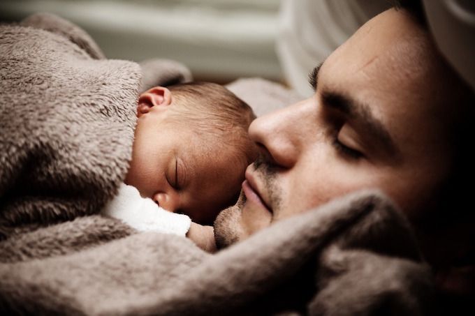 baby and dad sleeping