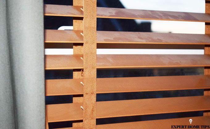 dusty wooden blinds