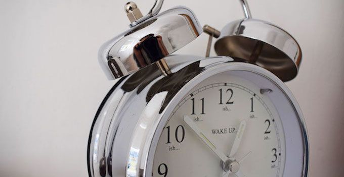 silver alarm clock