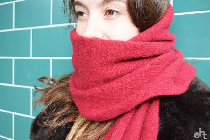 woman wearing a red scarf