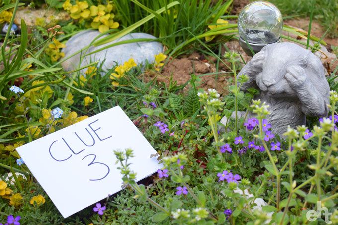 treasure hunt clue hidden in flower bed