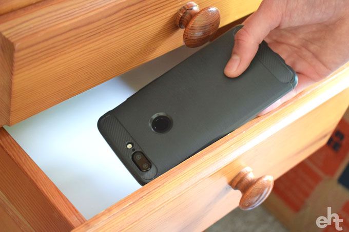 putting phone in drawer