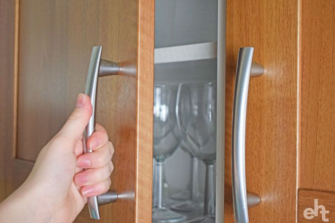 kitchen cupboards with wine glasses